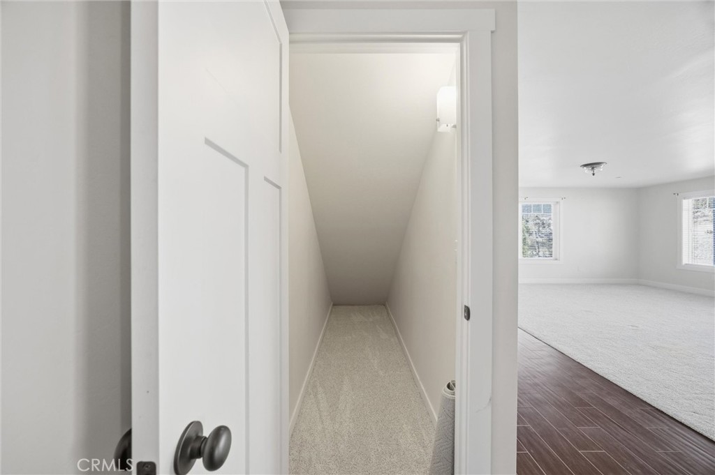 9401 Whispering Pines Road Frazier Park, CA 93225 - Photo 41 of 49 a view of a hallway with wooden floor