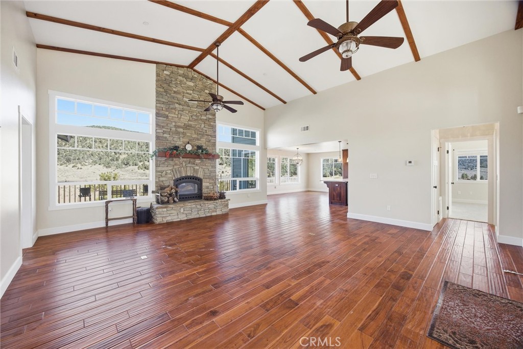 9401 Whispering Pines Road Frazier Park, CA 93225 - Photo 10 of 49 a living room with fireplace furniture and a fireplace