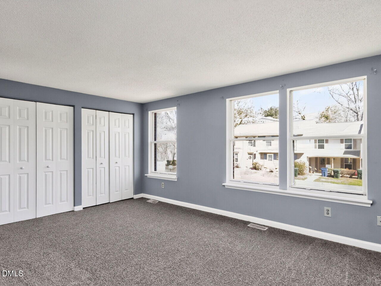 4333 Halliwell Drive Raleigh, NC 27606 - Photo 14 of 31 an empty room with windows