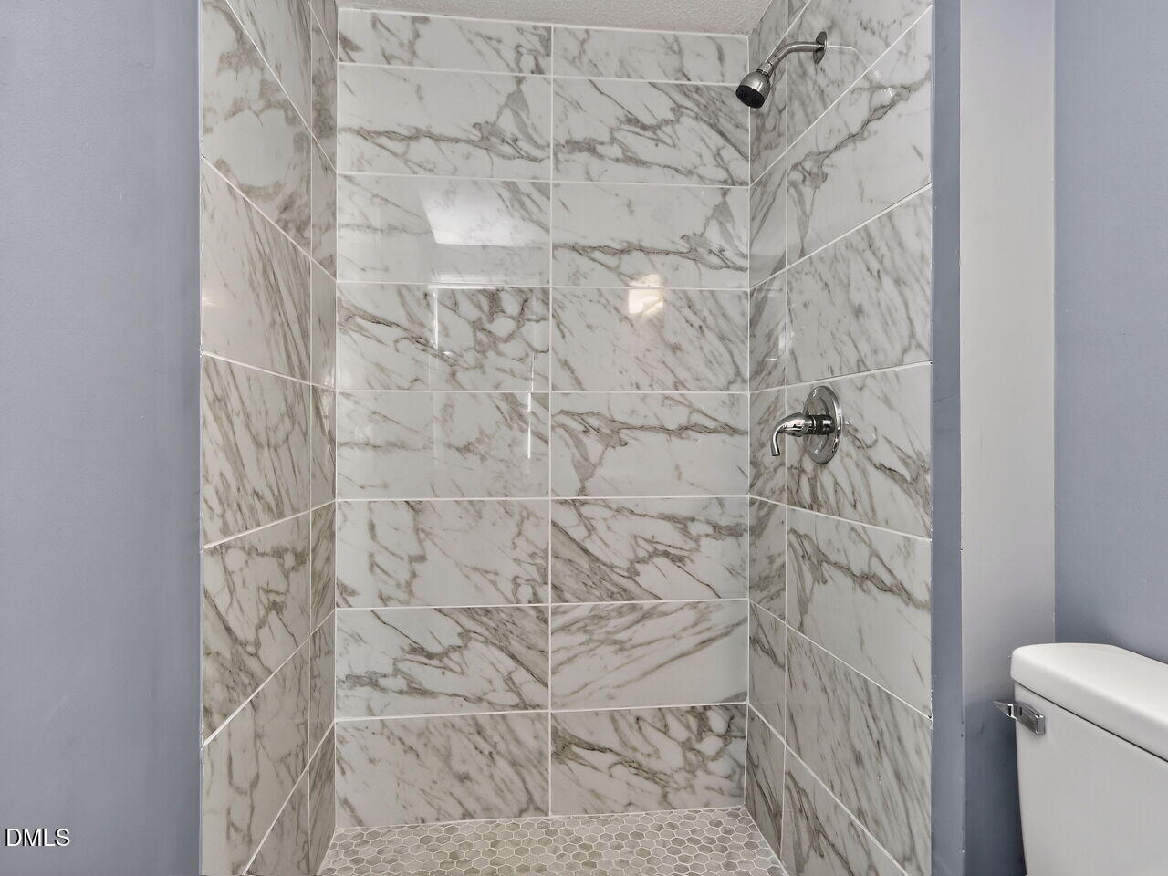 4333 Halliwell Drive Raleigh, NC 27606 - Photo 17 of 31 a bathroom with a shower