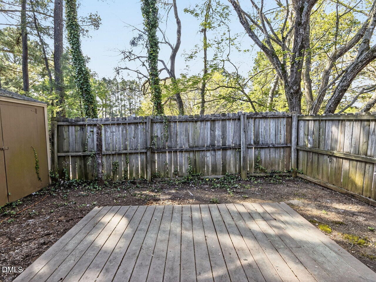 4333 Halliwell Drive Raleigh, NC 27606 - Photo 24 of 31 a view of wooden deck in a backyard