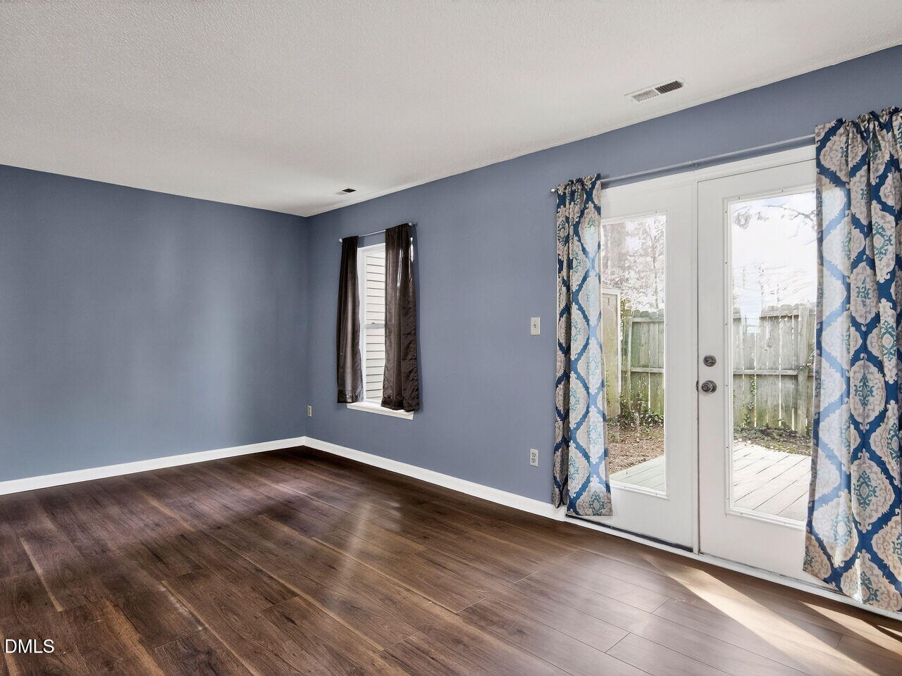 4333 Halliwell Drive Raleigh, NC 27606 - Photo 7 of 31 a view of an empty room with a window