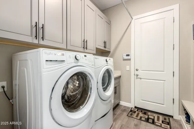 a bedroom with bed and windows