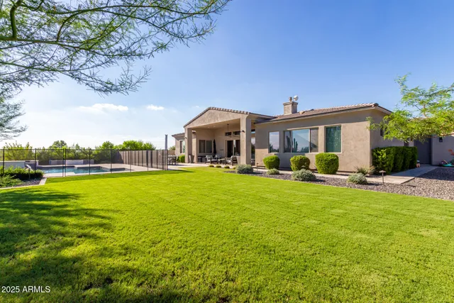 a view of a swimming pool from a balcony