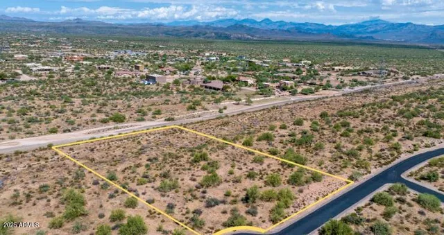 a front view of house with yard and outdoor seating