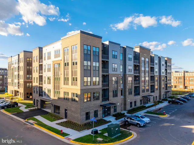 a front view of a building with street view