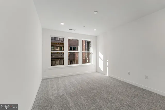 a view of a brick building from a balcony