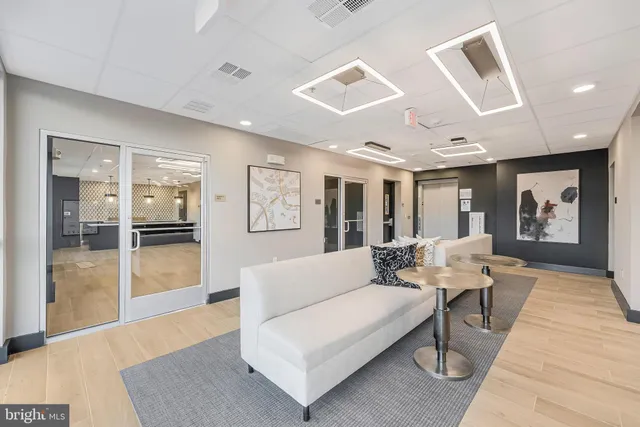 a front view of a building with lot of windows