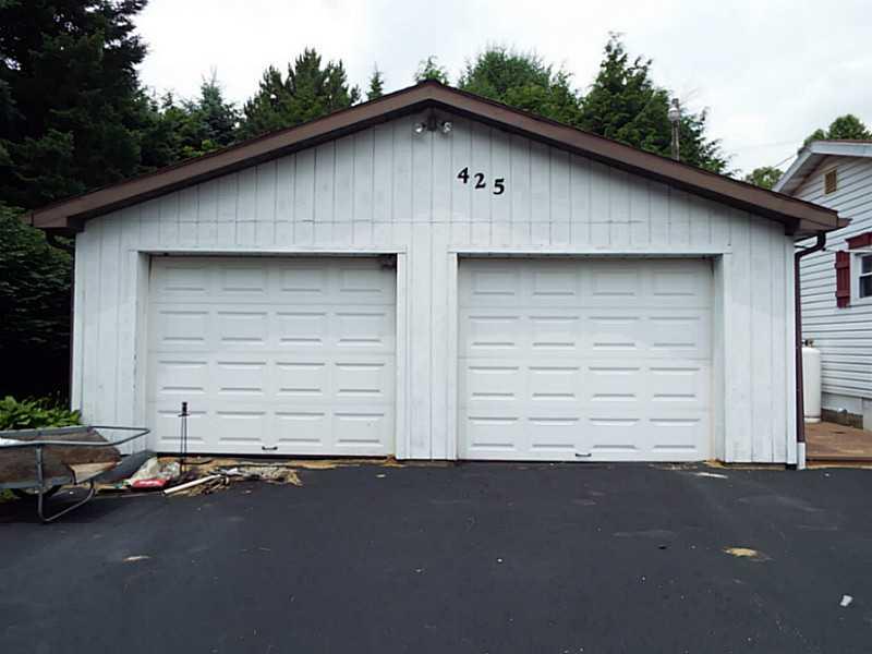 425 Mahood Road Butler, PA 16001 - Photo 3 of 22 Exterior Front. Floor of garage is also Paved