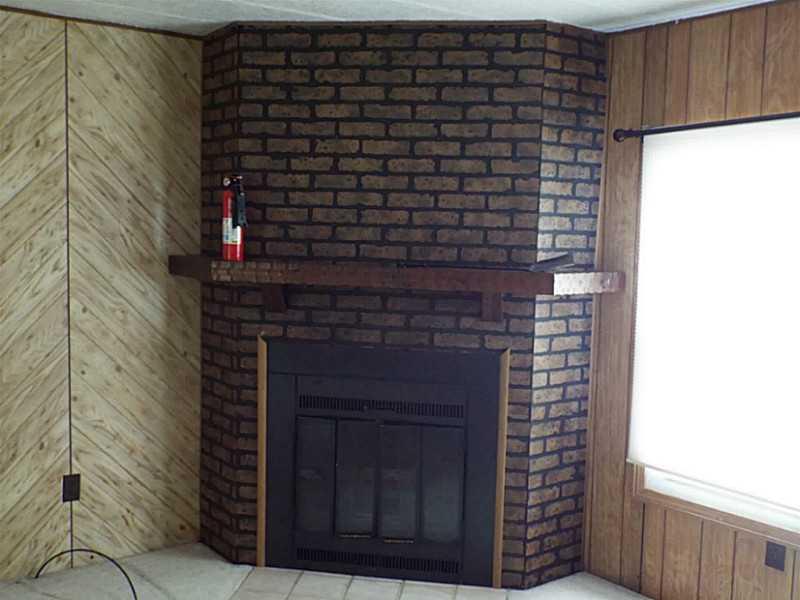 425 Mahood Road Butler, PA 16001 - Photo 8 of 22 Living Room. Wood burning fireplace