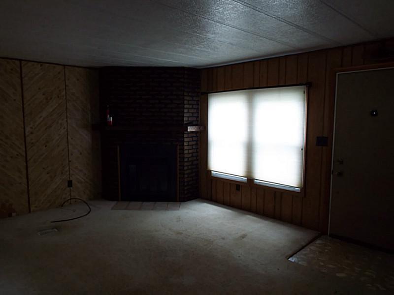 425 Mahood Road Butler, PA 16001 - Photo 9 of 22 Living Room. Wood burning fireplace