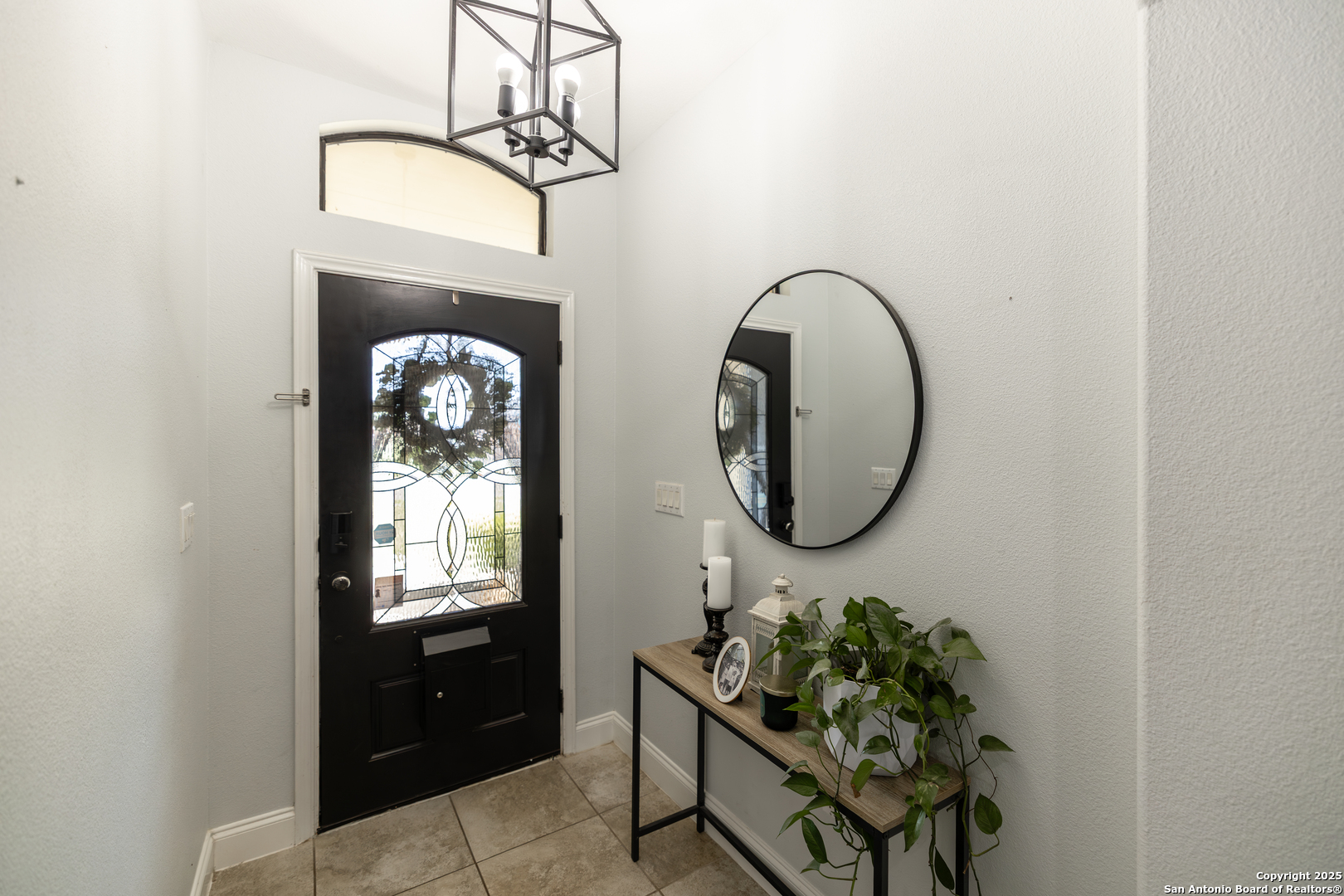 1038 Avenue H Poteet, TX 78065 - Photo 2 of 16 a front view of a house with entryway
