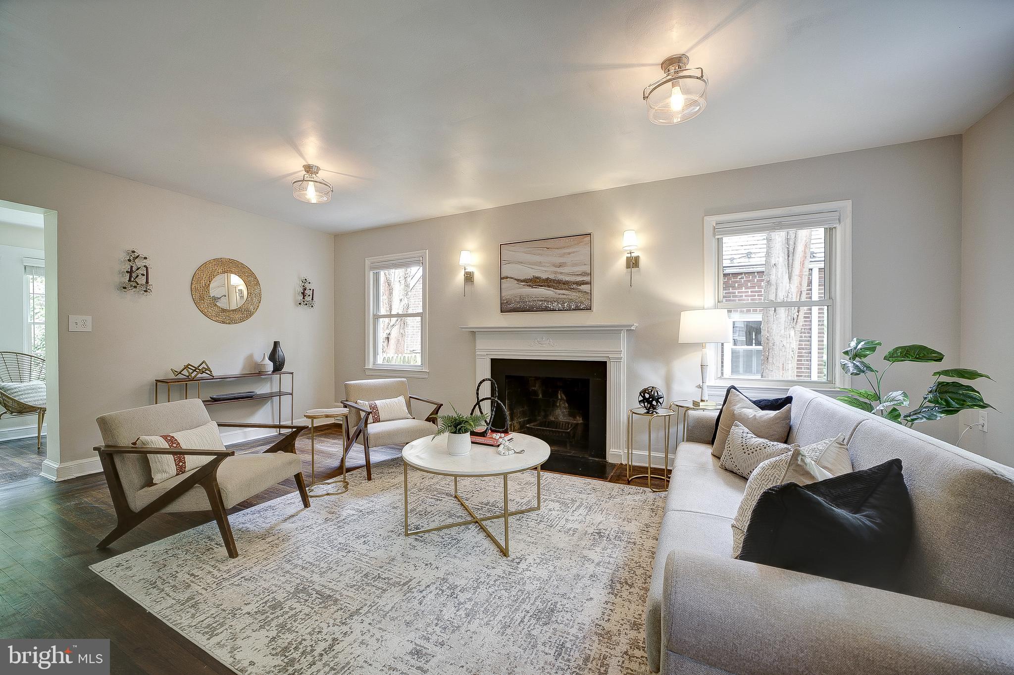 5348 29th Street Northwest Washington, DC 20015 - Photo 5 of 39 Living Room featuring a wood burning fireplace
