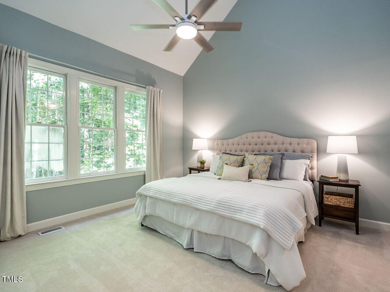 12205 Glenlivet Way Raleigh, NC 27613 - Photo 17 of 37 a bedroom with a bed and window
