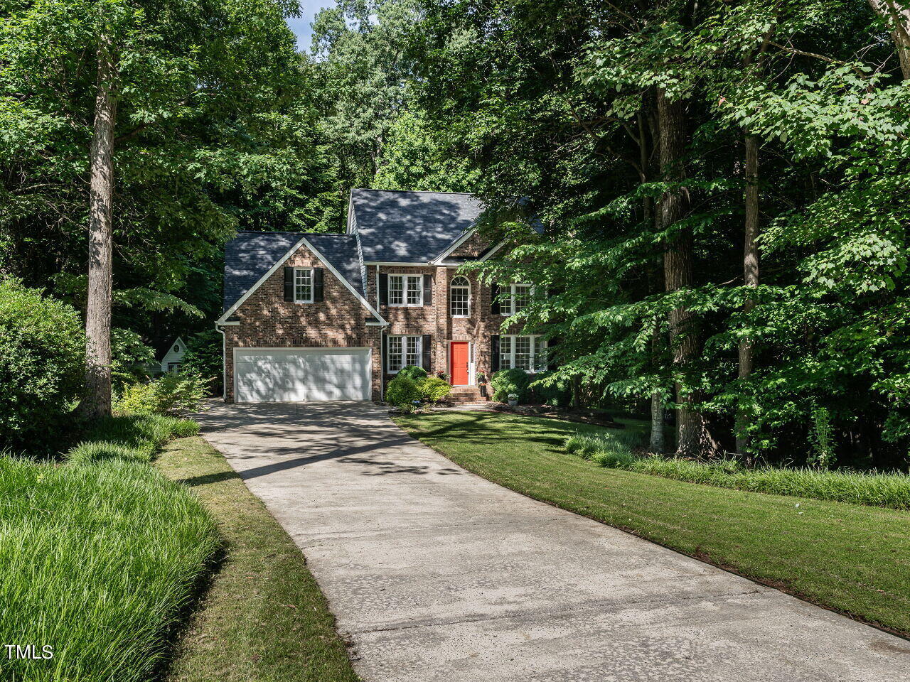 12205 Glenlivet Way Raleigh, NC 27613 - Photo 37 of 37 a view of road and house with green space