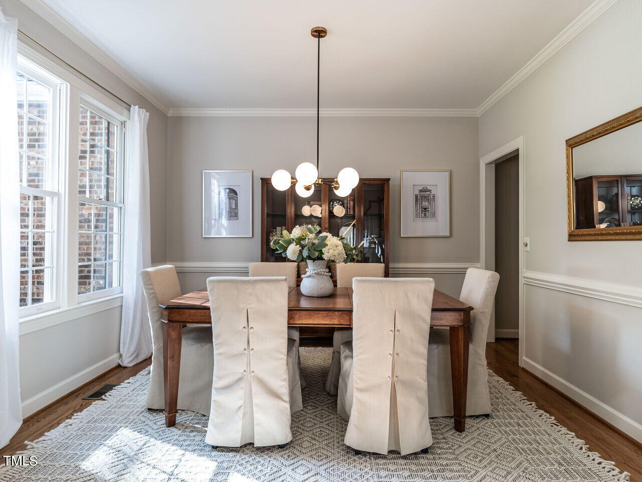 12205 Glenlivet Way Raleigh, NC 27613 - Photo 4 of 37 a dining room with furniture and window