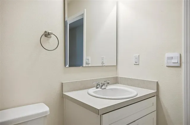 a bathroom with a bath tub with a shower