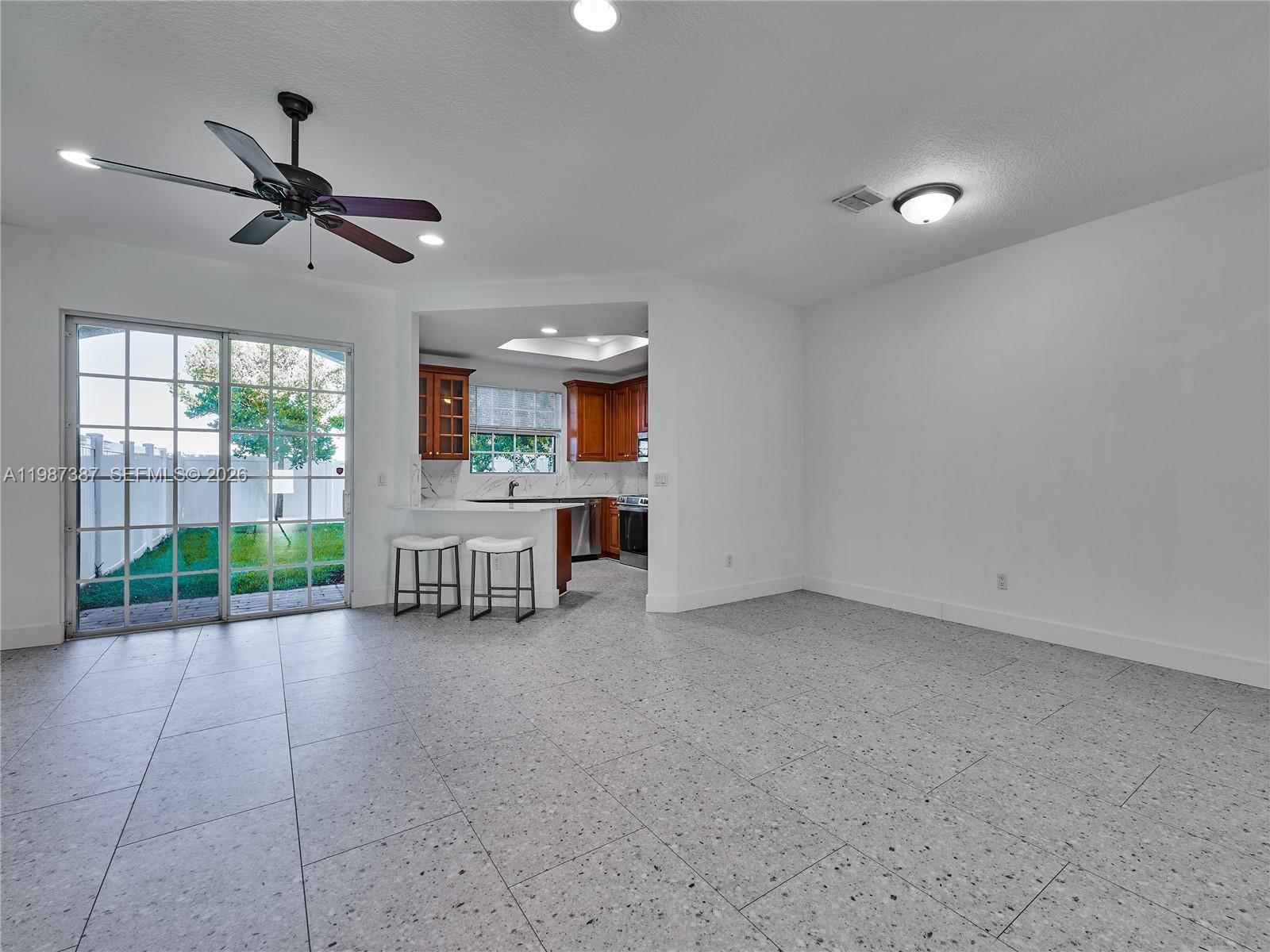 475 Ocean Ridge Way Juno Beach, FL 33408 - Photo 8 of 56 a view of an empty room with a balcony