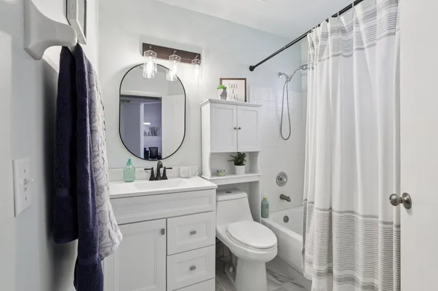 a room with furniture and a window