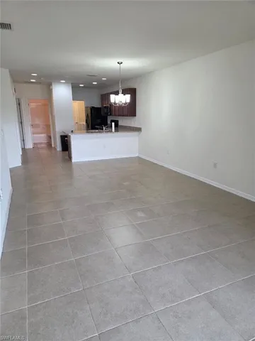 a view of a swimming pool with a yard