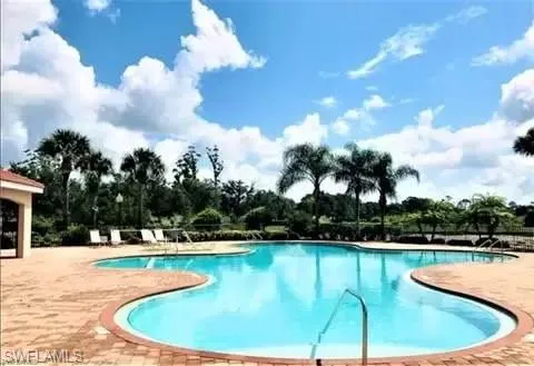 a view of a house with swimming pool