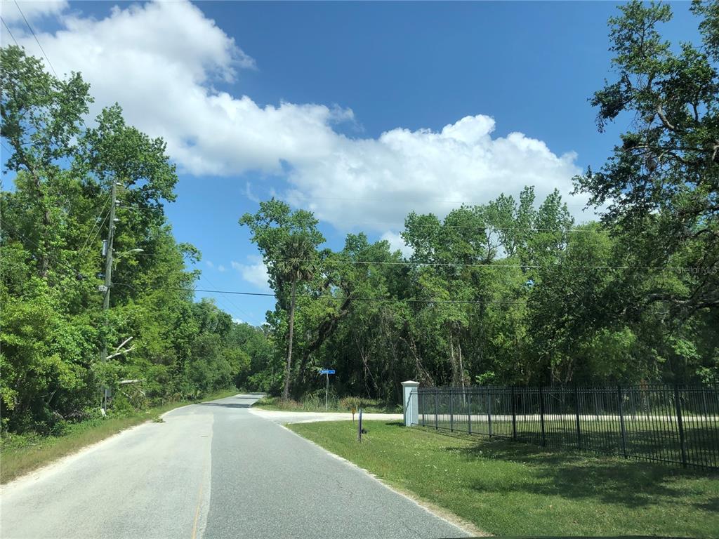 Keefer Trail Kissimmee, FL 34747 - Photo 10 of 12 a view of a golf course with a lake view