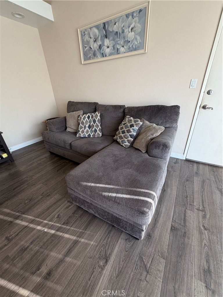 16040 Leffingwell Road Whittier, CA 90603 - Photo 15 of 17 a living room with couch and wooden floor