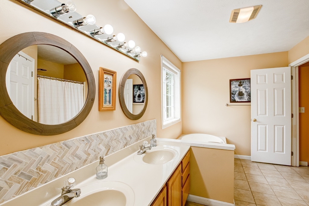 6 Loon Road Winchendon, MA 01475 - Photo 19 of 36 a bathroom with a sink and a mirror