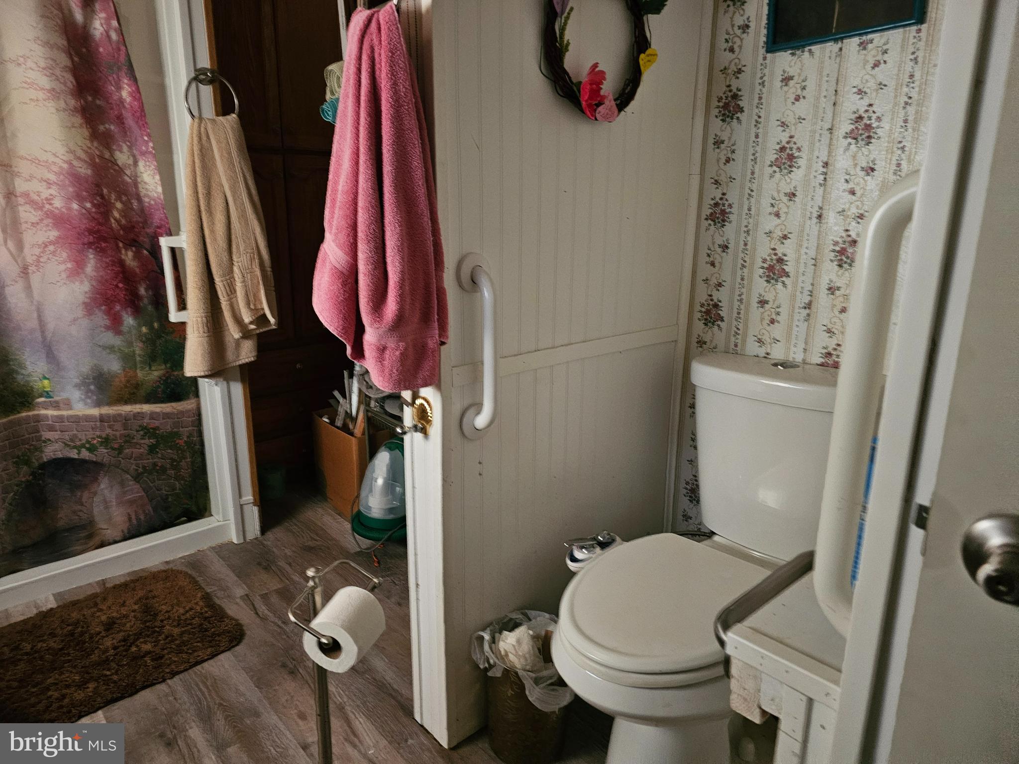 21 Vanessa Avenue Rising Sun, MD 21911 - Photo 7 of 13 a bathroom with a toilet and a shower curtain