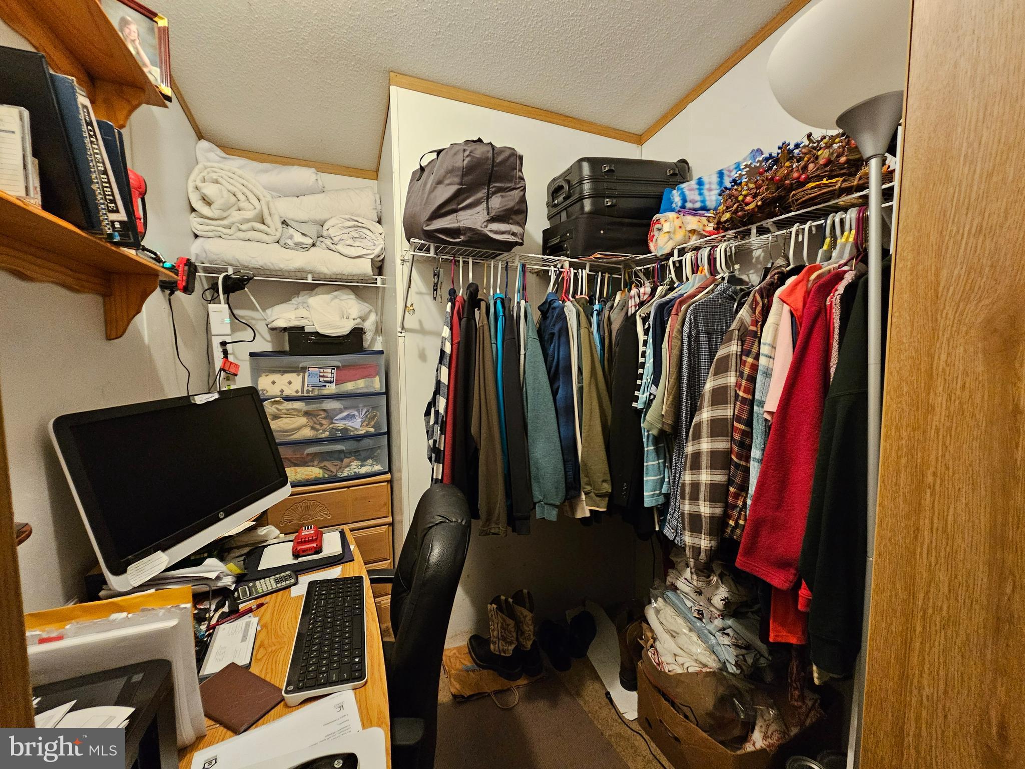 21 Vanessa Avenue Rising Sun, MD 21911 - Photo 8 of 13 a view of walk in closet with clothes