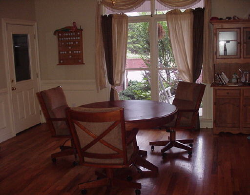 95 Thunder Ridge Drive Cleveland, GA 30528 - Photo 1 of 1 a view of a workspace with furniture and a window