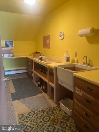 a bathroom with a sink and a toilet