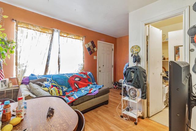 a living room filled with furniture and a couch