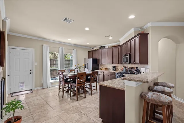 a view of a dining room with furniture