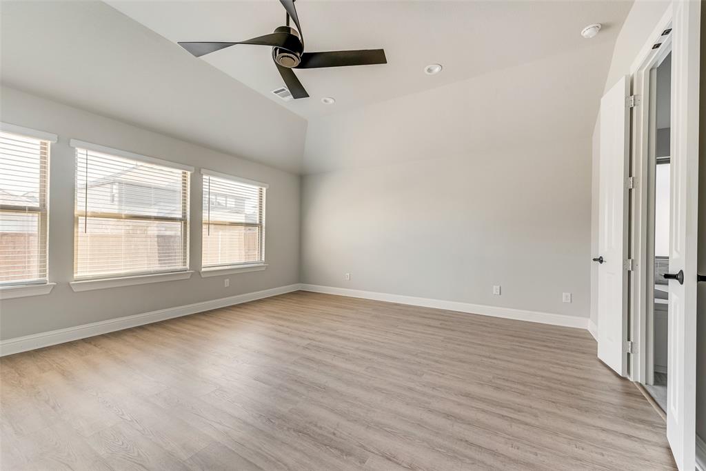 1905 Graham Way Mansfield, TX 76063 - Photo 15 of 20 wooden floor in an empty room with a window