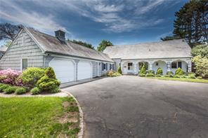 66 Island Drive Rye, NY 10580 - Photo 1 of 1 a front view of a house with a yard and outdoor seating