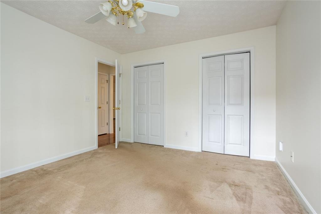 244 Kerry Drive Jasper, GA 30143 - Photo 15 of 24 a view of an empty room and chandelier fan