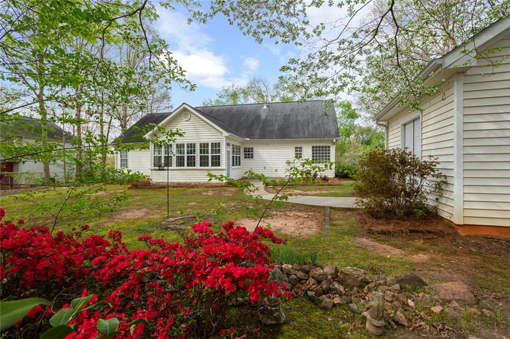 244 Kerry Drive Jasper, GA 30143 - Photo 21 of 24 a front view of a house with a big yard and fountain