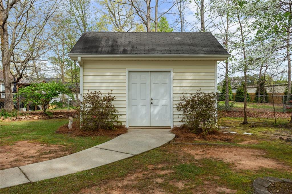 244 Kerry Drive Jasper, GA 30143 - Photo 22 of 24 a front view of a house with garden