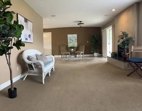 a view of a livingroom with furniture and a livingroom
