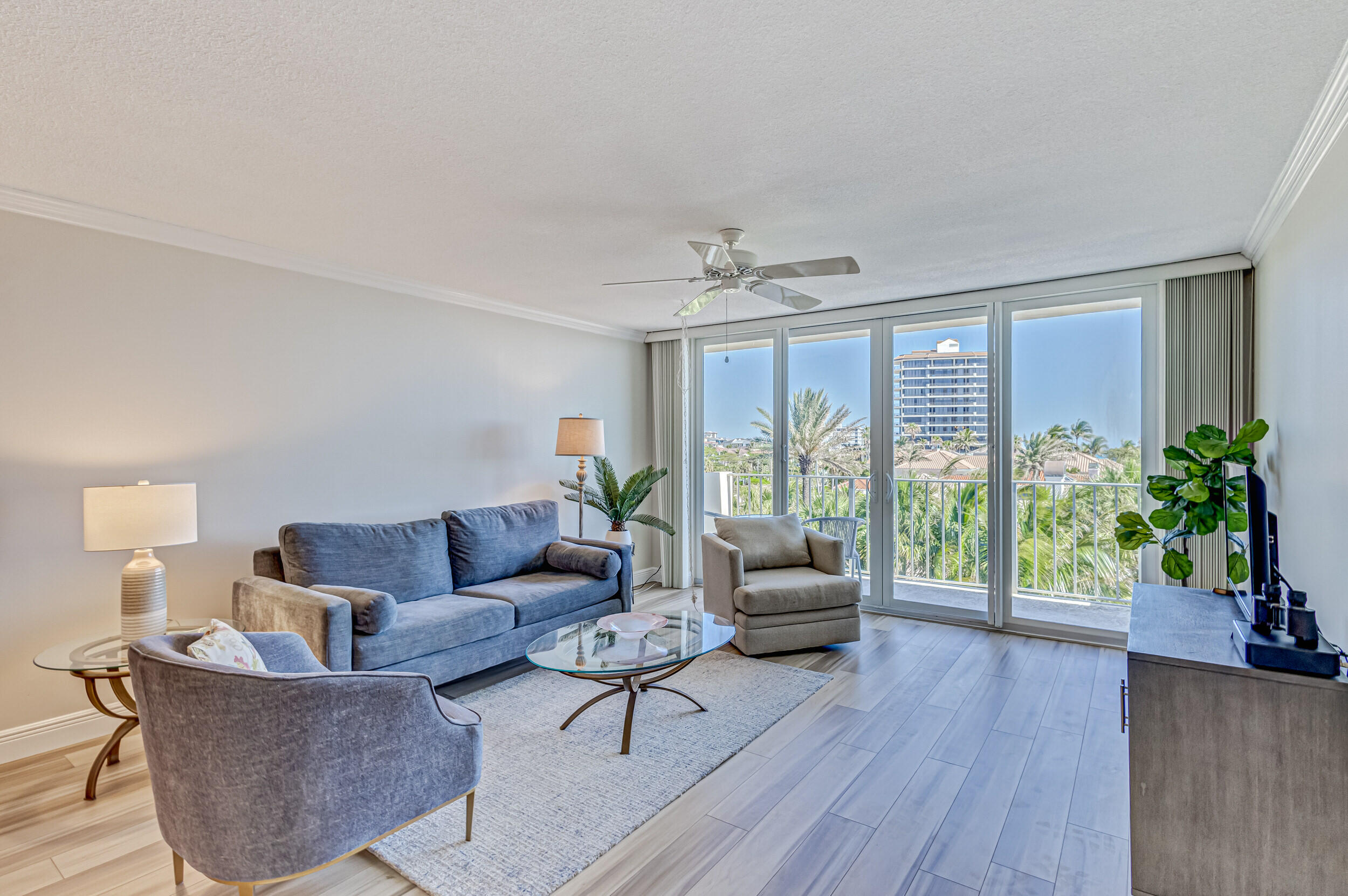 630 Ocean Drive, Unit 505 Juno Beach, FL 33408 - Photo 11 of 49 a living room with furniture and a large window
