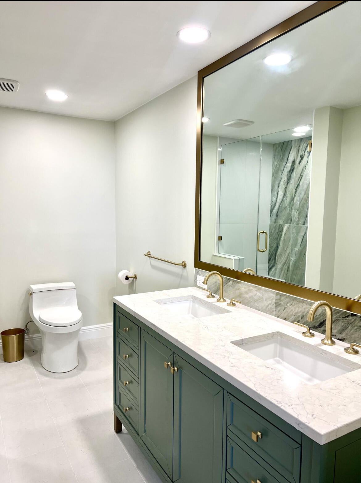 630 Ocean Drive, Unit 505 Juno Beach, FL 33408 - Photo 19 of 49 a bathroom with a granite countertop sink and a mirror