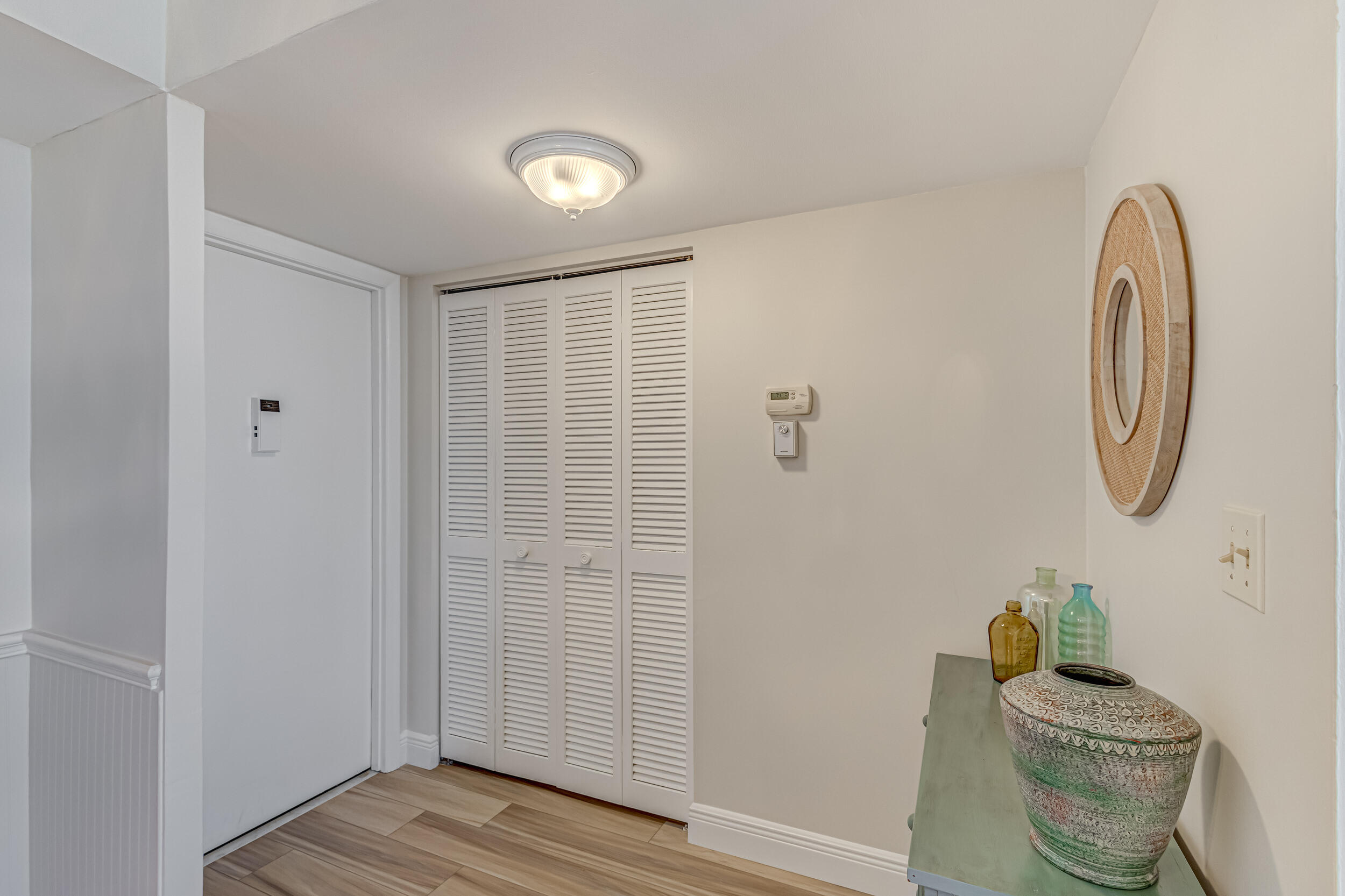 630 Ocean Drive, Unit 505 Juno Beach, FL 33408 - Photo 2 of 49 a bathroom with a sink and a mirror