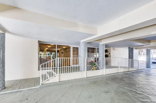 a view of a entryway with livingroom