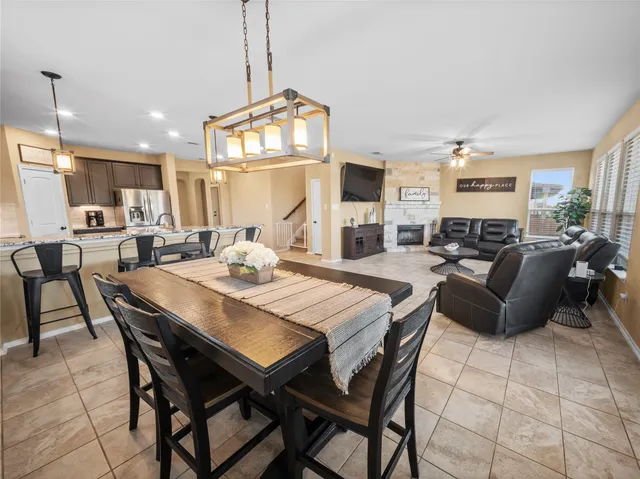 a kitchen with granite countertop wooden cabinets stainless steel appliances and a granite counter tops
