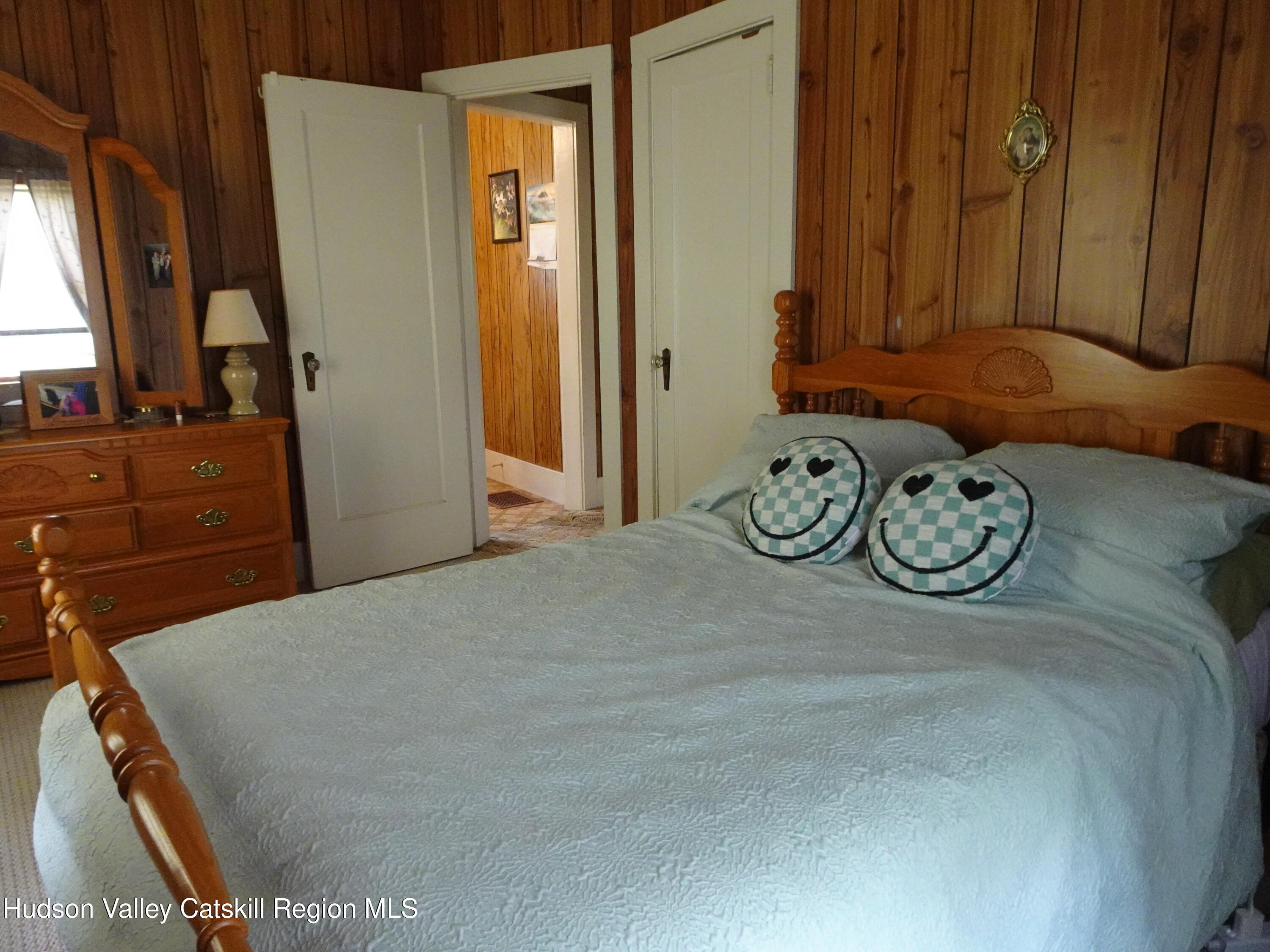 135 Millbrook Road Hudson, NY 12534 - Photo 25 of 40 a bedroom with a bed and dresser