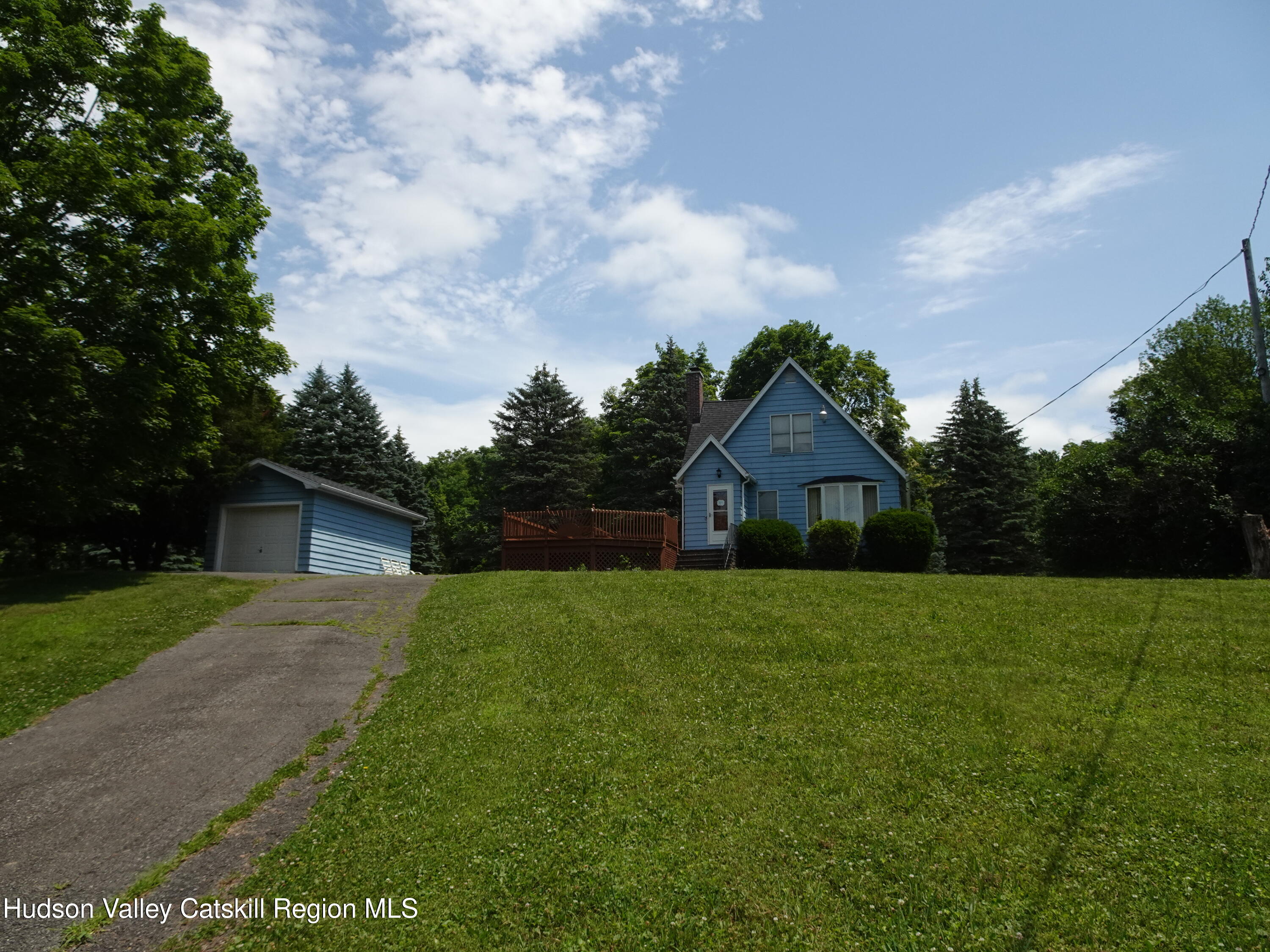 135 Millbrook Road Hudson, NY 12534 - Photo 34 of 40 a view of a house with yard and a large tree