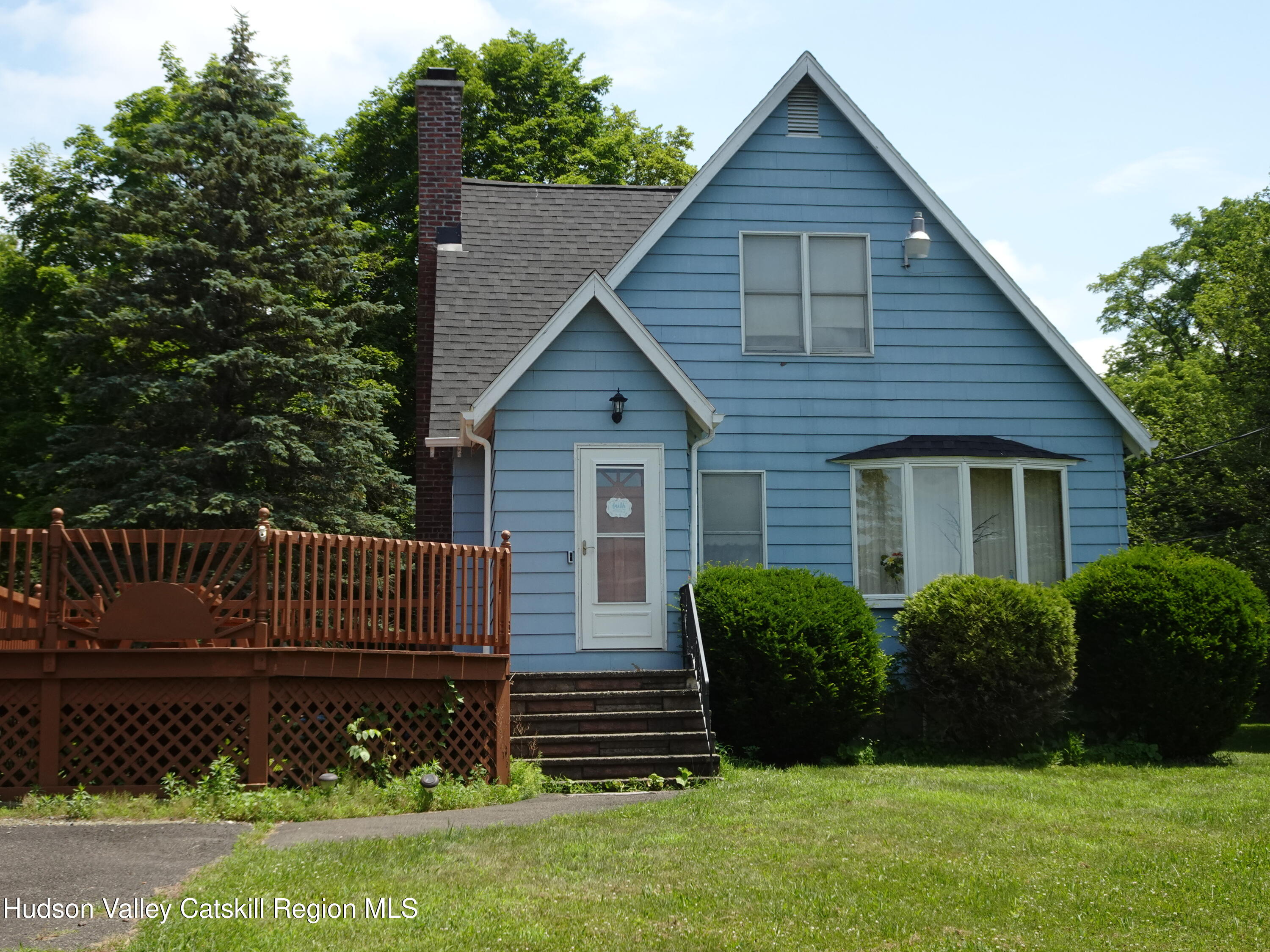135 Millbrook Road Hudson, NY 12534 - Photo 35 of 40 a front view of a house with garden
