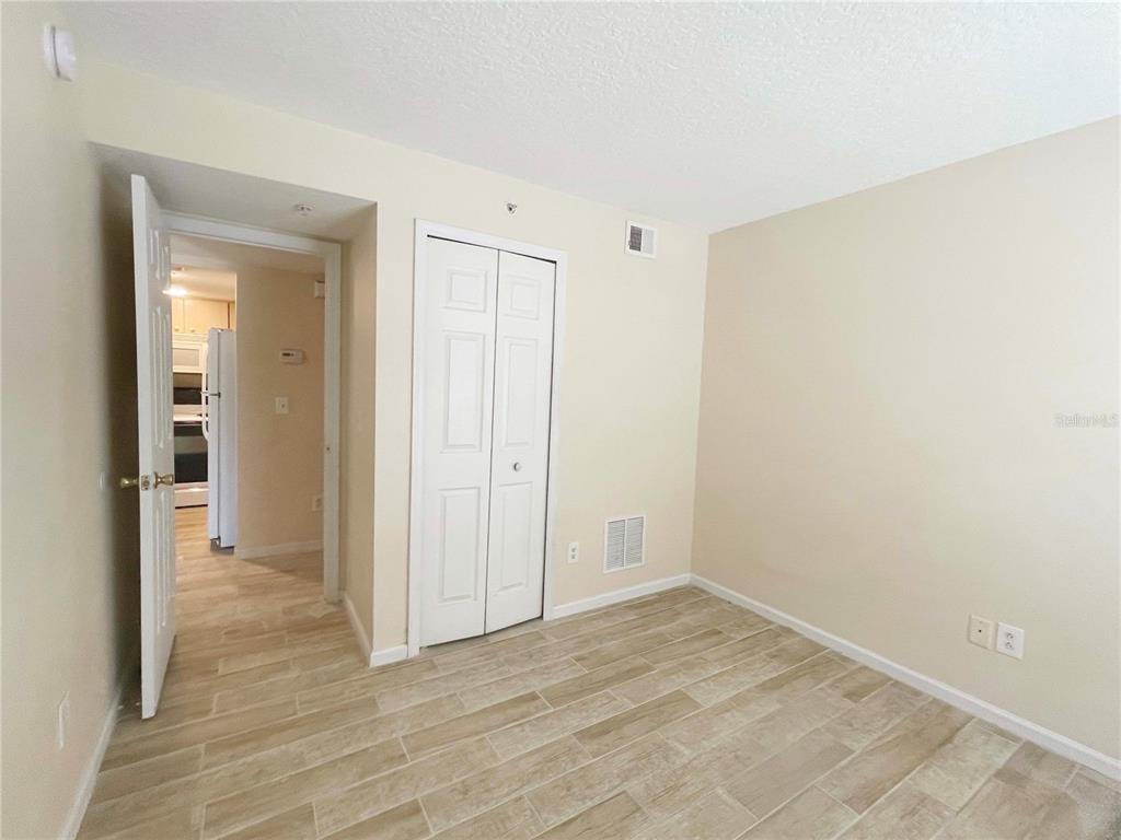 1122 South Pine Ridge Circle, Unit 1122 Sanford, FL 32773 - Photo 2 of 19 a view of an empty room