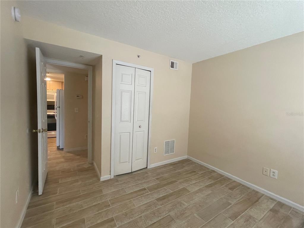 1122 South Pine Ridge Circle, Unit 1122 Sanford, FL 32773 - Photo 9 of 19 a view of an empty room